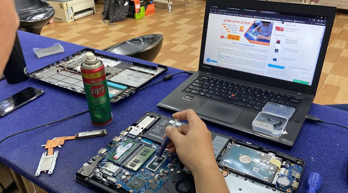 vệ sinh laptop dĩ an